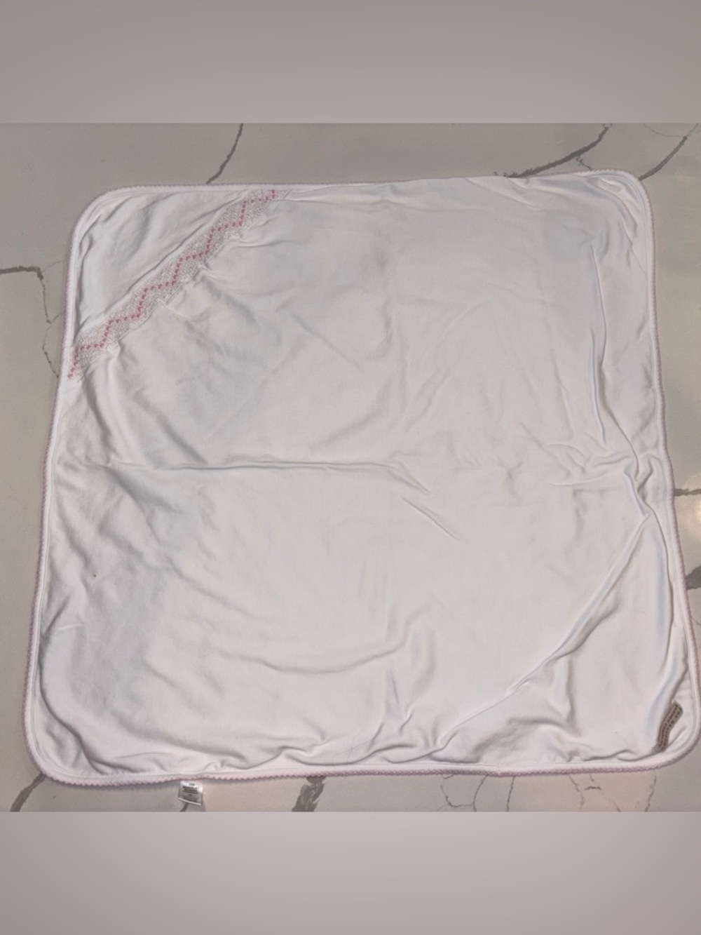 The Beaufort Bonnet Company White Baby Blanket with Pink Trim and Smock Pattern